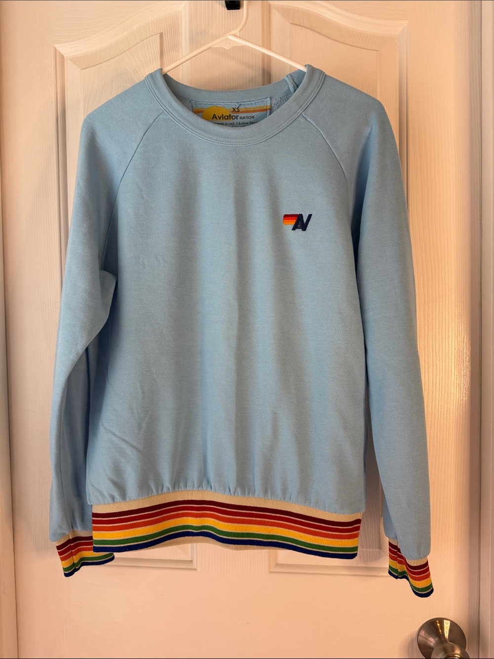 Aviator Nation Sky Blue Crewneck with Rainbow Stripe Trim